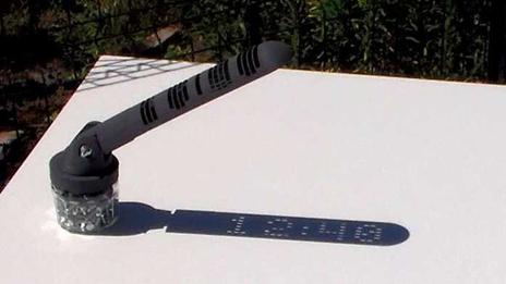 The digital sundial displays the current time within its own shadow